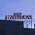 Clever Vandals Place “F*** Starbucks” Sign Above Starbucks And Get Away With It