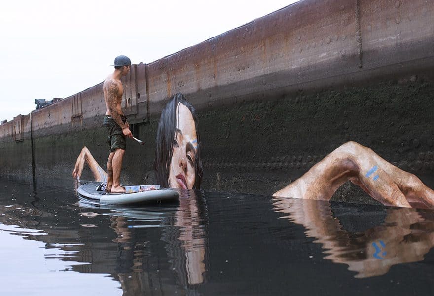 This Artist Paints Stunning Seaside Murals While Balancing On A Paddleboard