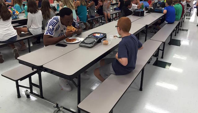A Boy With Autism Was Eating Alone, So This Famous Football Player Joined Him For Lunch