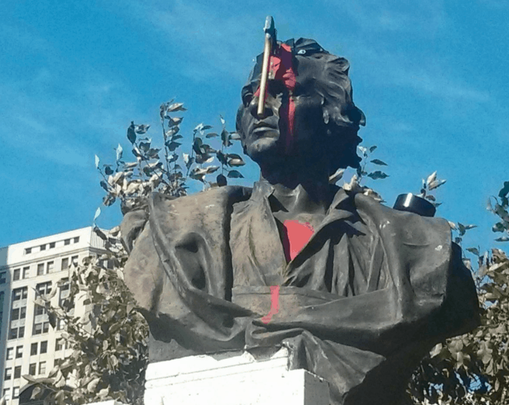 Someone Stuck An Ax Into This Statue Of Christopher Columbus