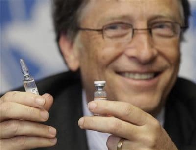 Bill Gates, co-chair of the Bill & Melinda Gates Foundation poses with vaccine against meningitis during a news conference after his address to the 64th World Health Assembly at the United Nations European headquarters in Geneva May 17, 2011. REUTERS/Denis Balibouse