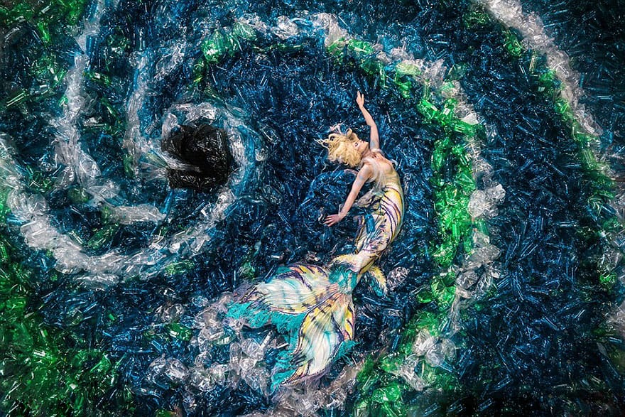 Mermaids Swim In 10,000 Water Bottles To Raise Awareness About Plastic Pollution