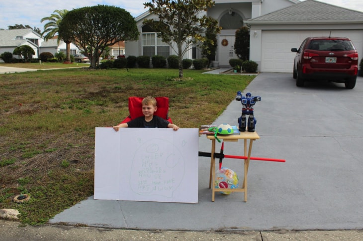 Boy Sets Up ‘Free Toy Stand’ To Offer Toys To Less Fortunate Neighbors