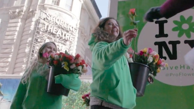 Activists Pass Out 10,000 Roses To New Yorkers On International Happiness Day