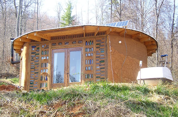 Eco-Friendly House Was Built Using Sand Bags And Glass Bottles