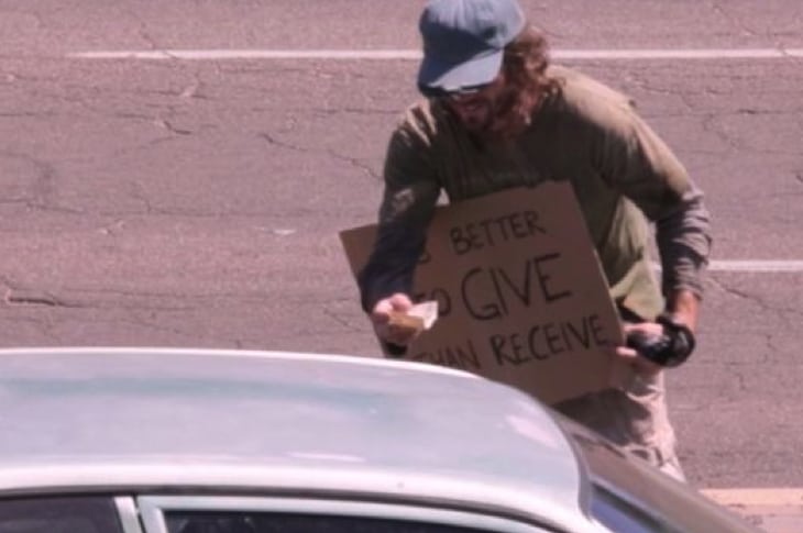 Man In Disheveled Clothes Surprises Strangers By Handing Them The One Thing They Don’t Expect…