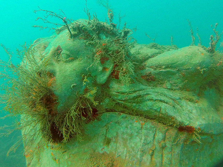 Art And Biodiversity Have Been Brought Back To Life in an Italian Lake With Fisherman’s Underwater Sculptures
