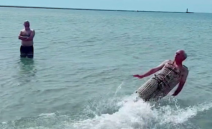 Man Makes Floating Suit From 1,150 Corks And Surprises Family With Launch In Lake Michigan